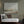Harmony's Promise abstract landscape canvas print in white floating frame styled in earthy olive living room