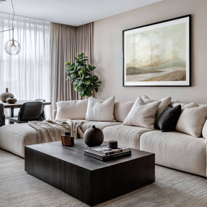 Harmony's Promise limited edition landscape paper print in black frame above cream sectional sofa in contemporary living room – abstract wall art DT Art Studio.