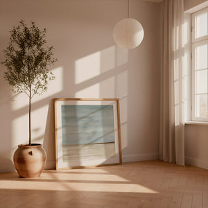 After The Rain limited edition paper print in oak frame leaning against wall – abstract seascape wall art DT Art Studio.
