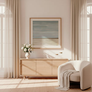 After The Rain abstract coastal paper print in oak frame above timber sideboard in sunlit elegant living room – DT Art Studio.