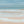 Coastal Azure abstract seascape print – crystal blue ocean and sandy shore, limited edition print DT Art Studio.