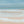 Coastal Azure abstract seascape print – crystal blue ocean and sandy shore, limited edition print DT Art Studio.