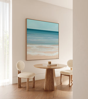 Coastal Azure large format canvas print in oak frame styled in bright coastal dining room – DT Art Studio.