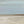 Detail of After the Rain print – abstract seascape with birds, sandy shore and soft sky tones