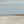 Detail of After the Rain print – abstract seascape with birds, sandy shore and soft sky tones
