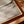 Close-up of Unbound canvas print in oak floating frame – soft misty seascape detail, DT Art Studio.