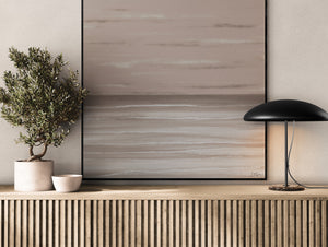 Dusk limited edition canvas print in black floating frame on timber sideboard – abstract coastal wall art Australia