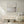 Unbound abstract coastal canvas print in white floating frame styled in minimalist living room