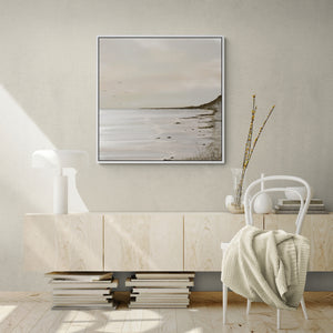 Unbound abstract coastal canvas print in white floating frame styled in minimalist living room